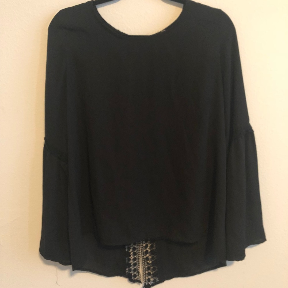 Black long sleeved blouse with lace detailing